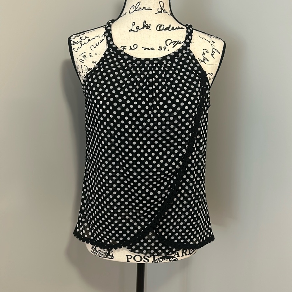 Black and white polka dot sleeveless top, unique styling with crossover panels M